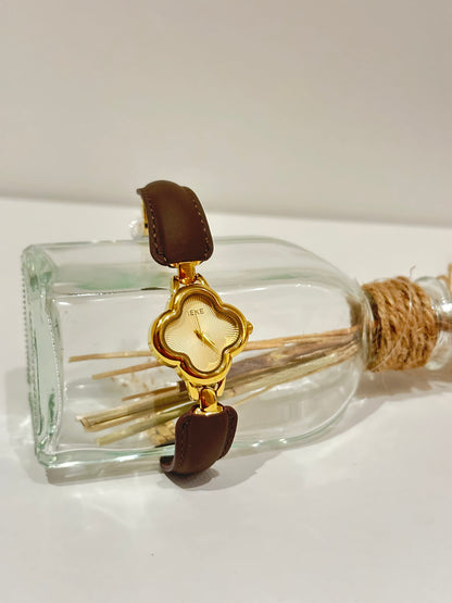brown/gold flower watch