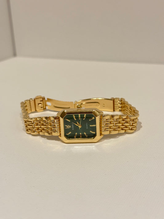 green dial gold watch
